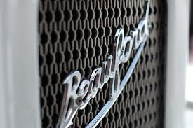 front grill of the white beauford wedding car