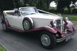 white and maroon beauford wedding car